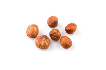 Hazelnuts on the white background