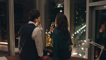 Man seducer flirting woman drinking champagne. Couple in love talking sitting.