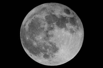 Closeup of the fool moon at night with black background