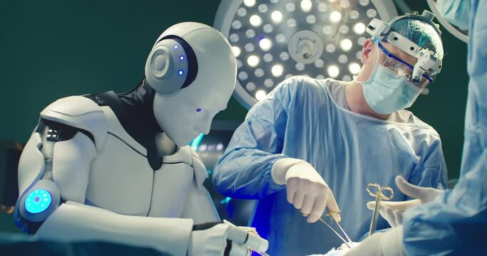 Medical artificial intelligence. Robotic surgery. Professional medical surgeon operates on patient in hospital with participation of robot. Innovative minimally invasive surgery with robotic system.