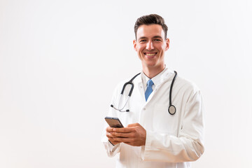 Fototapeta premium Image of young doctor using phone.