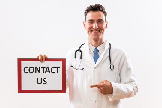 Image of doctor holding a paper with a text contact us.