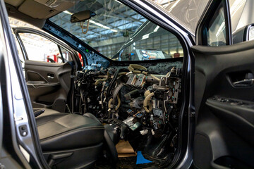 car repair in garage service station with soft-focus and over light in the background