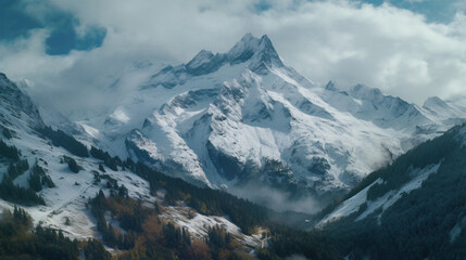 Fototapeta premium Snow covered peaks of the Himalayas and Alps, with dramatic clouds hovering above