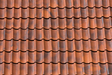 Red tiles roof background