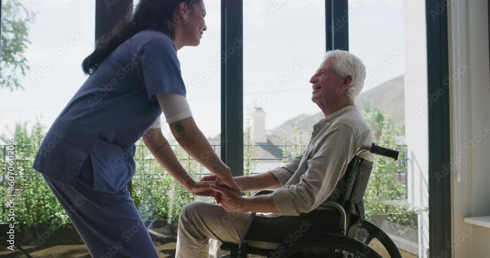 Wall mural Nurse, senior man and home with wheelchair, talking and kindness with smile, respect and helping hand. Medic woman, care and elderly person with disability in house, conversation and morning sunshine