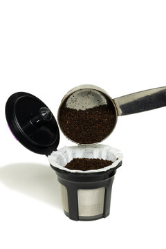 A Reusable K Cup Pod Being Filled With Coffee Grounds