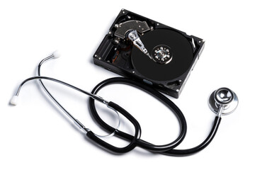 Fototapeta na wymiar Hard disk drive and stethoscope. HDD diagnostic and repair