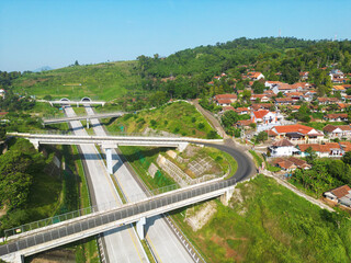 Aerial view of the iconic Cisumdawu twin tunnel toll road in Sumedang district, West Java,...