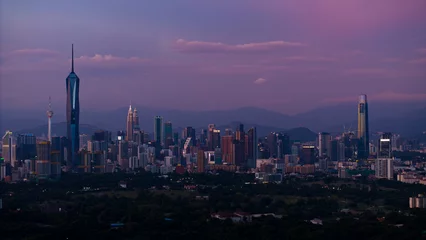Keuken spatwand met foto KL city view from far distances, the twin towers lights up UAE  MALAYSIA flag as the Crown Prince of Abu Dhabi on His special visit © MuhammadSyafiq
