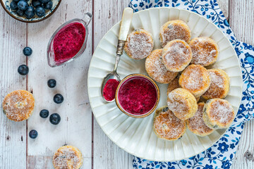 Traditional fennel Welsh cakes with blueberry coulis