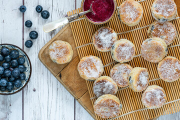Traditional fennel Welsh cakes with blueberry coulis