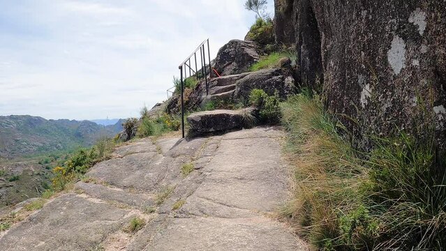 a rocky mountain path on the way up to the castle of Castro Laboreiro, municipality of Melga&ccedil;o, district of Viana do Castelo, Portugal