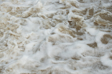 texture of water at the bottom of a weir