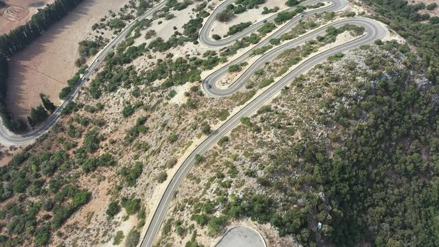 A winding aerial road leading up Mount Tabor