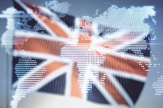 Abstract creative world map interface on flag of Great Britain and sunset sky background, international trading concept. Multiexposure