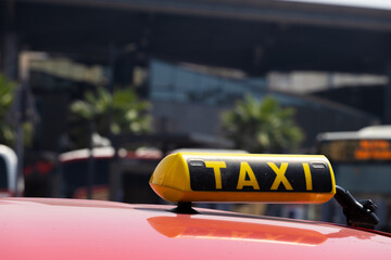 taxi sign on the car