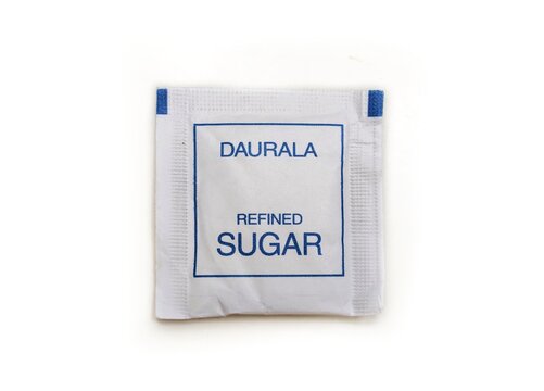 Guwahati, Assam, India - March 28, 2023 : Daurala Refined Sugar pack in isolated background.
