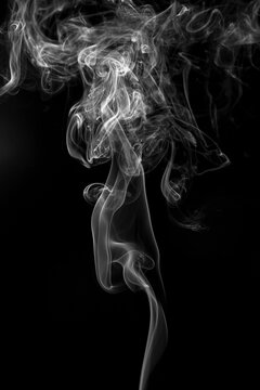Abstract smoke isolate on black background.