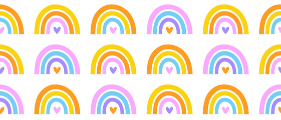 Obraz premium Colorful Rainbow Seamless Vector Pattern. Irregular Hand Drawn Simple Nursery Print ideal for Fabric,Textile,Wrapping Paper. Rainbow and Hearts Isolated on a White Background.