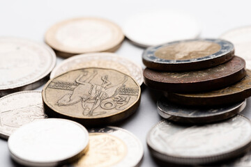 euro currency, czech crowns currency, swiss francs currency and polish zloty currency coins on white background