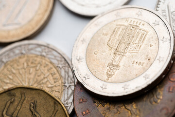 euro currency, czech crowns currency, swiss francs currency and polish zloty currency coins on white background