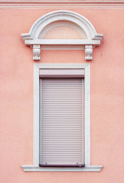 plastic windows on the vintage wall. traditional old european architecture