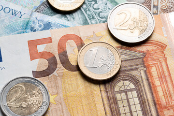 polisch currency zloty and euro currency coins and banknotes