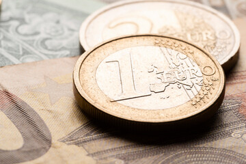 Euro currency coins on banknote close-up