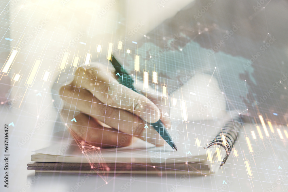 Poster multi exposure of abstract financial diagram with world map and with man hand writing in notepad on 