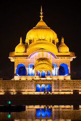 night view, sacred place kusum sarovar on govardhan hill, temple in india, place of pilgrimage