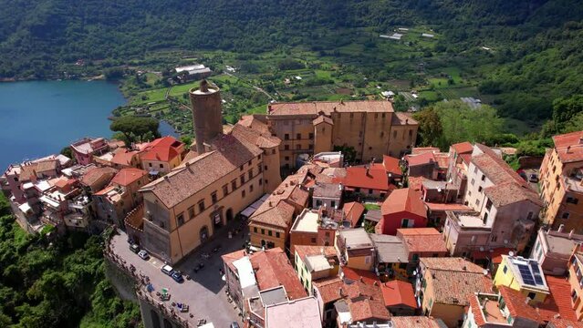  Most scenic lakes of Italy - volcanic Lago di Nemi , aerial drone view of Nemi village and volcano crater. popular touristic site near Rome