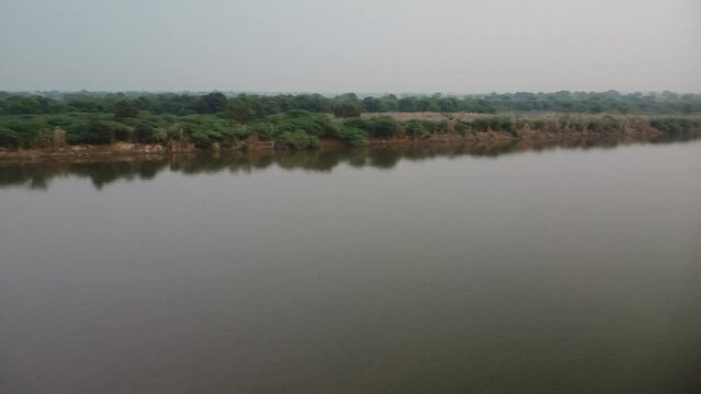 drone filming at sunset, sacred river yamuna in vrindavan in india, place of pilgrimage, holy place