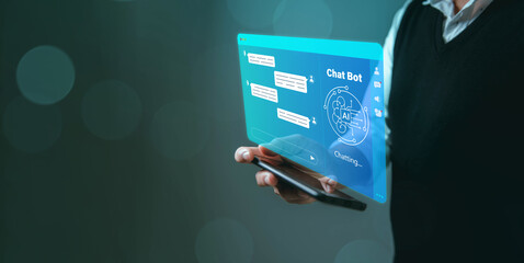 Business man using digital chatbot application Artificial Intelligence (AI) at home for online...