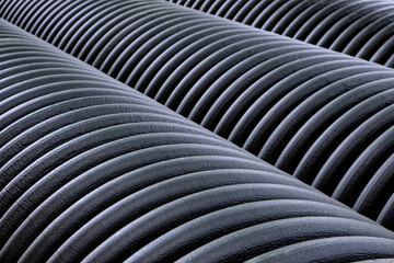 Close-up of large plastic corrugated pipes for water supply systems.