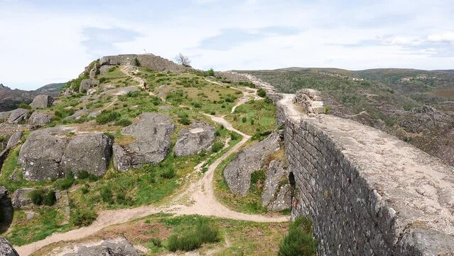 people running inside the medieval castle of Castro Laboreiro, municipality of Melga&ccedil;o, district of Viana do Castelo, Portugal