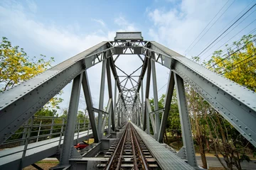 Foto op Canvas Old railway iron bridge in countryside at Ban Dara, Pichai District, Uttaradit, Thailand. Name is Paramin Bridge also known as Baan Dara Bridge It is a railway bridge over the Nan River © somchairakin