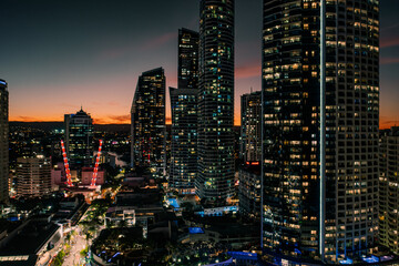 Fototapeta na wymiar Glowing Skyscrapers: Captivating Aerial View of Luminescent Surfers Paradise at Sunset - Australia's Mesmerizing Cityscape Shines at Night