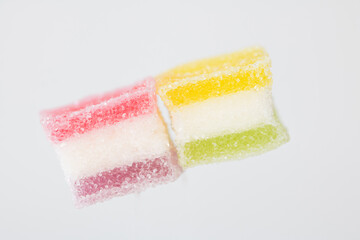 sugar coated jelly with beautiful colors on white background with copy space