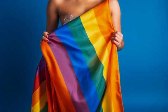Expressive Generative AI pride photo of a lesbian woman with rainbow flag patterns. Inclusive society with equal rights. Pride day month celebration of diversity and inclusion.
