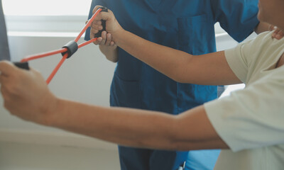 Patient doing some special exercises under supervision in a room