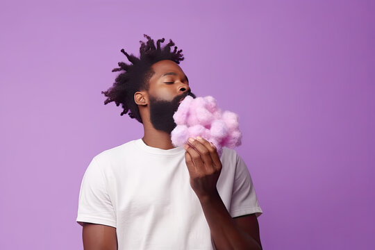 Thoughtful modern african american guy holds pink cloud in hand on purple background, created with Generative AI.