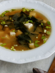 Homemade authentic miso soup with kombu dashi, tofu, wakame seaweed and scallions.