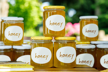 Honey collected from bees, bees give honey, honey in jars, bees work in the hive, hardworking bees make healthy honey, health, healing