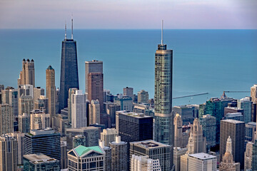 Fototapeta na wymiar Chicago city skyscrapers aerial view, blue sky background. Skydeck observation deck