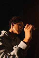 person painting a picture