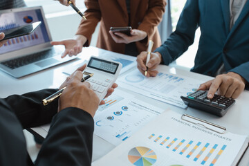 Professionals business team meeting  conference with project planning document analysis and investment decision making at office workplace. Team of asian business working together.