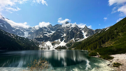 beautiful landscape view of Lake Morskie Oko in the mountains with clear water and reflection in Zakopane Poland in the Tatra National Park © Sheviakova