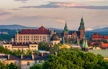 Wawel castle during colorful sunset with snowy Tatra mountains in the background, Krakow, Poland - 607152610
