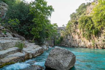 Rocky canyon with a flowing river through it. located in Koprulu Canyon, Antalya, Turkey